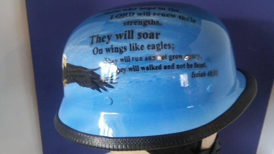 World War 2 helmet with bald eagle and verses