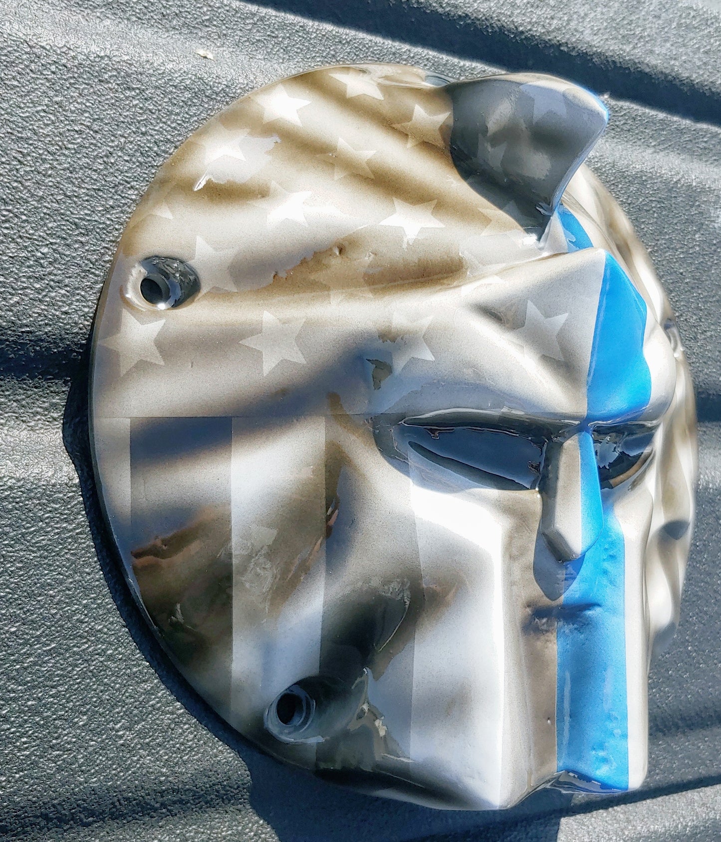 Spartan stretching through Thin Blue Line Flag Harley derby cover