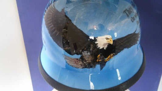 World War 2 helmet with bald eagle and verses