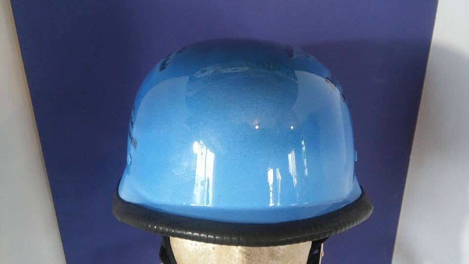 World War 2 helmet with bald eagle and verses