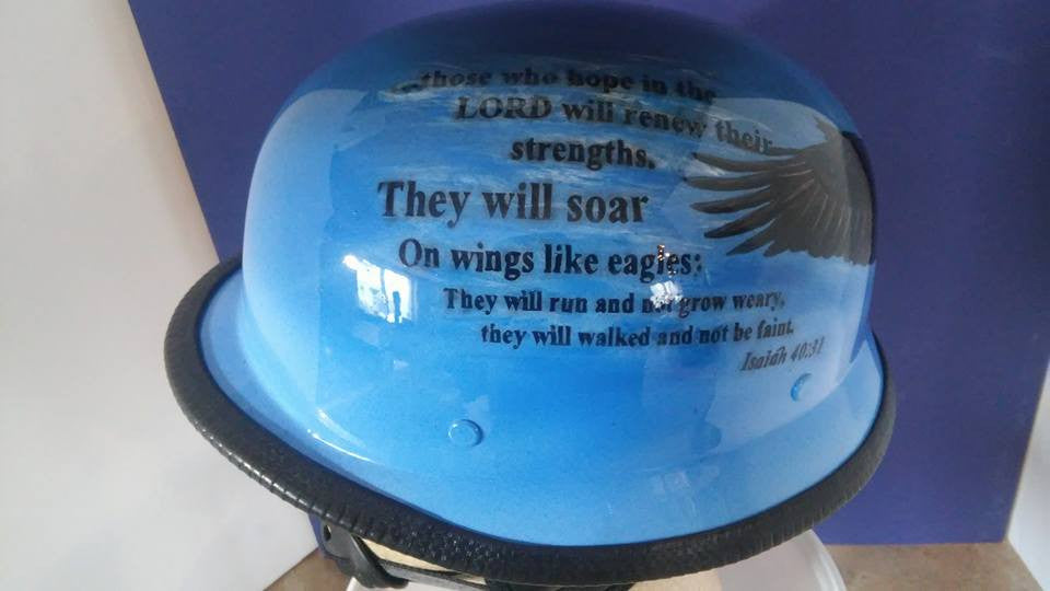 World War 2 helmet with bald eagle and verses