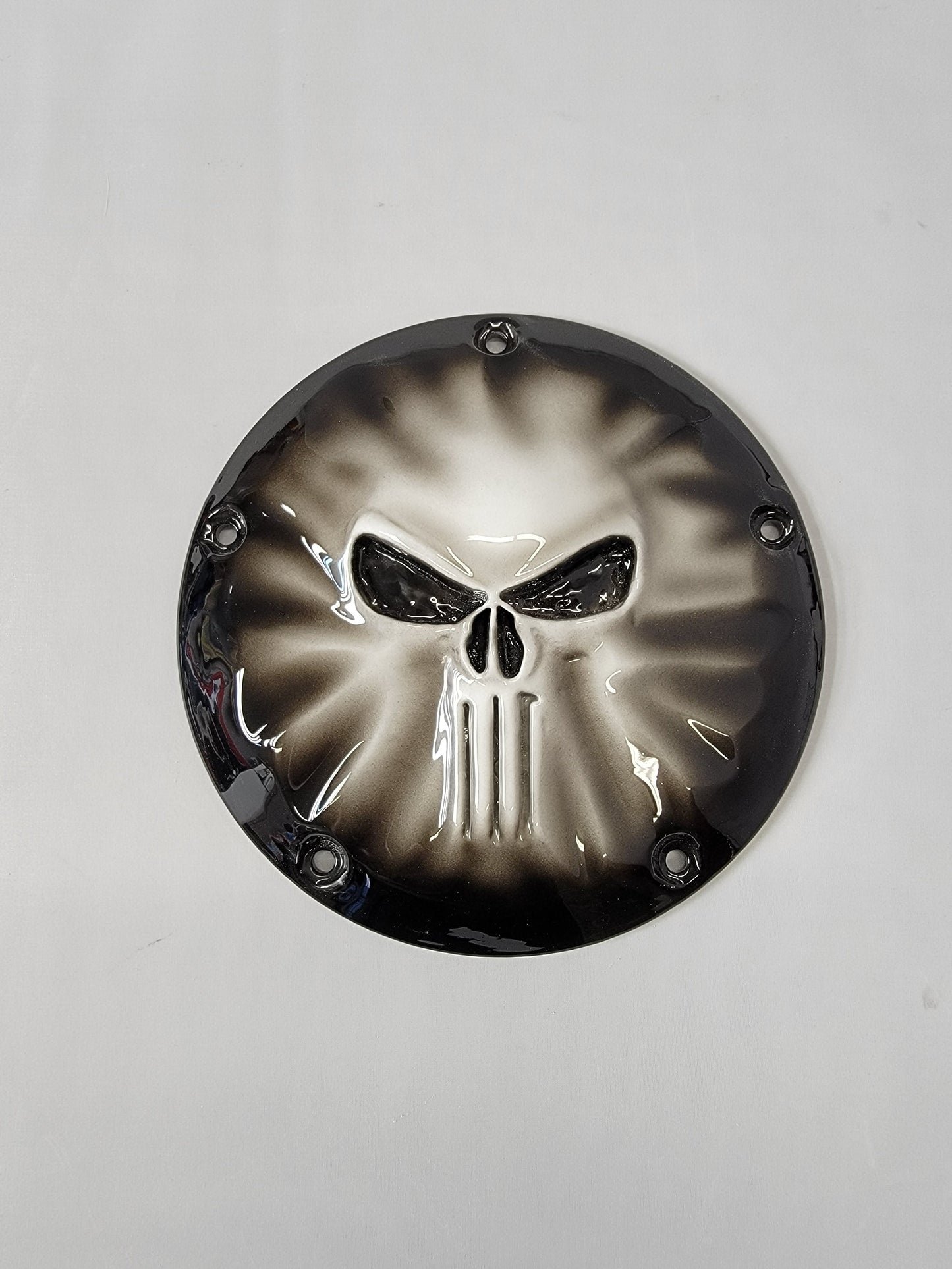 Punisher stretching through Harley derby cover