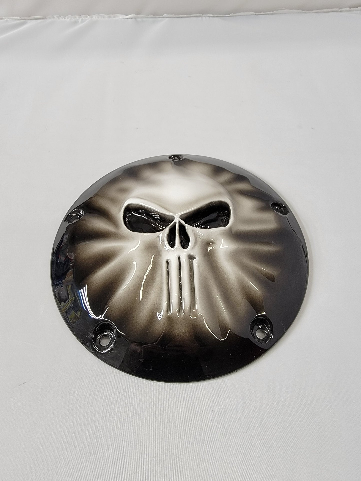 Punisher stretching through Harley derby cover