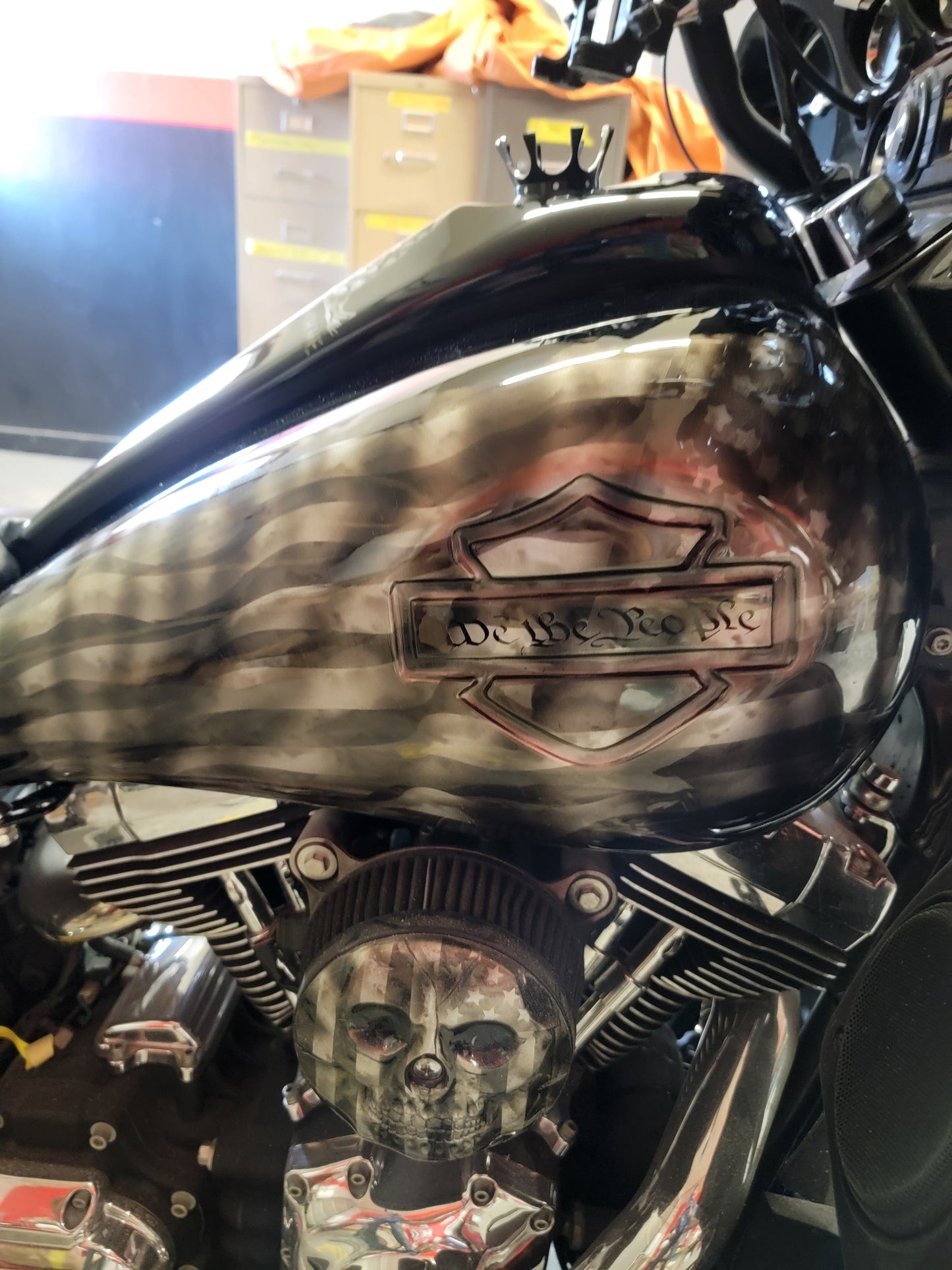 Stretched 6 gallon tank cover shrouds large emblem