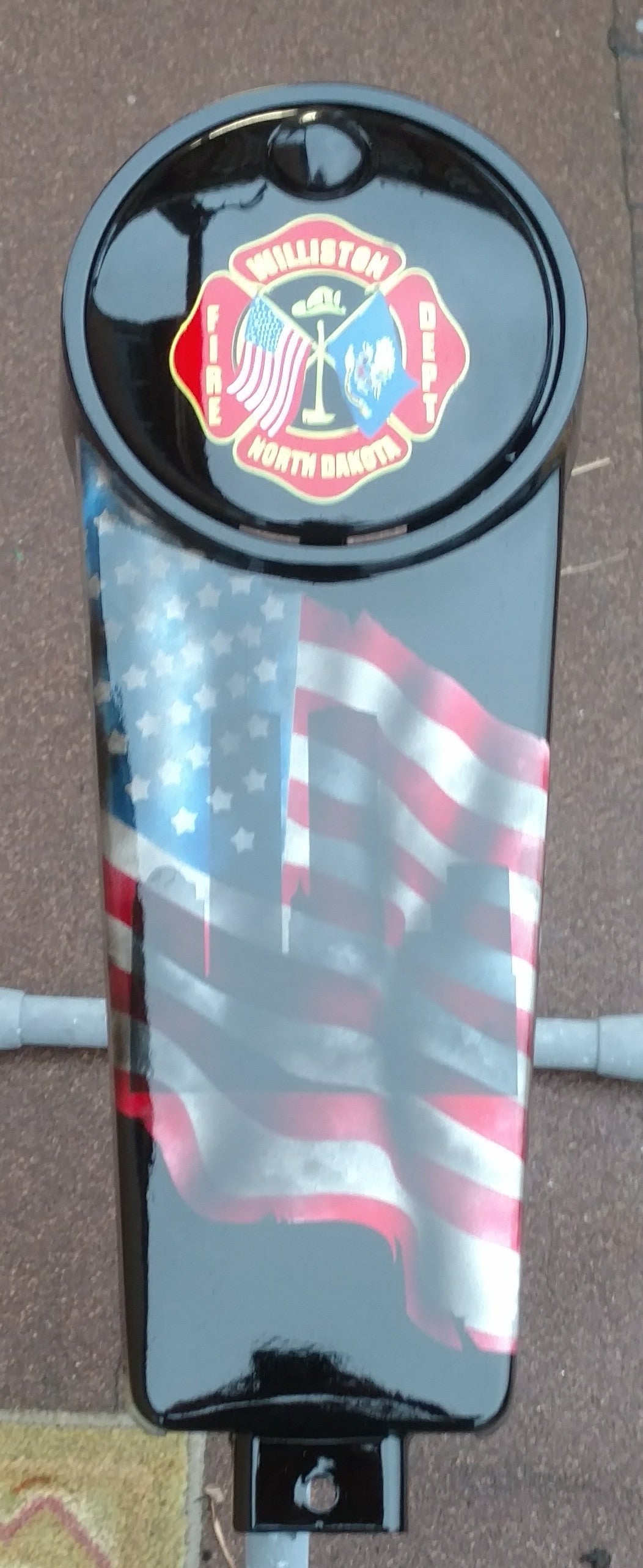 Harley Davidson 9/11 tribute on a worn and tattered American flag console