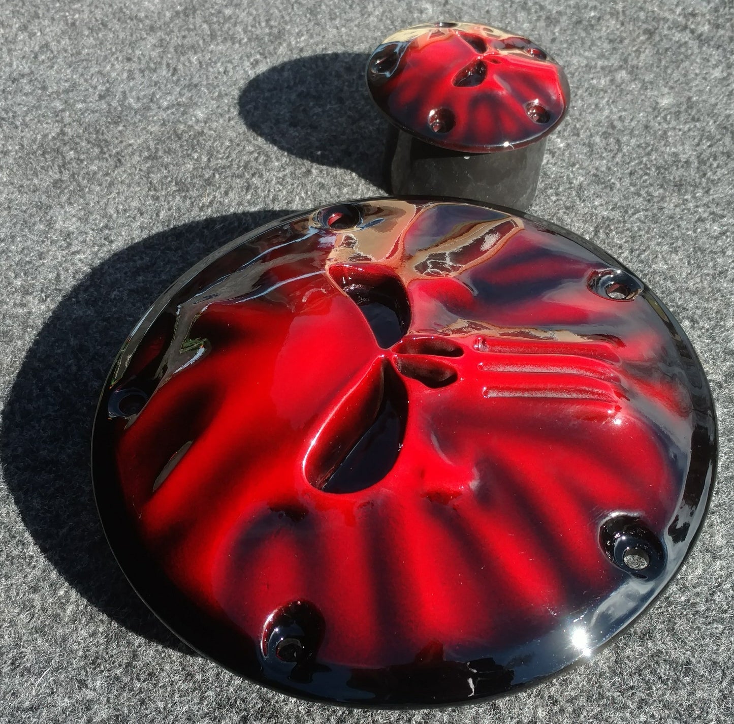 Punisher stretching through Harley derby cover and points cover