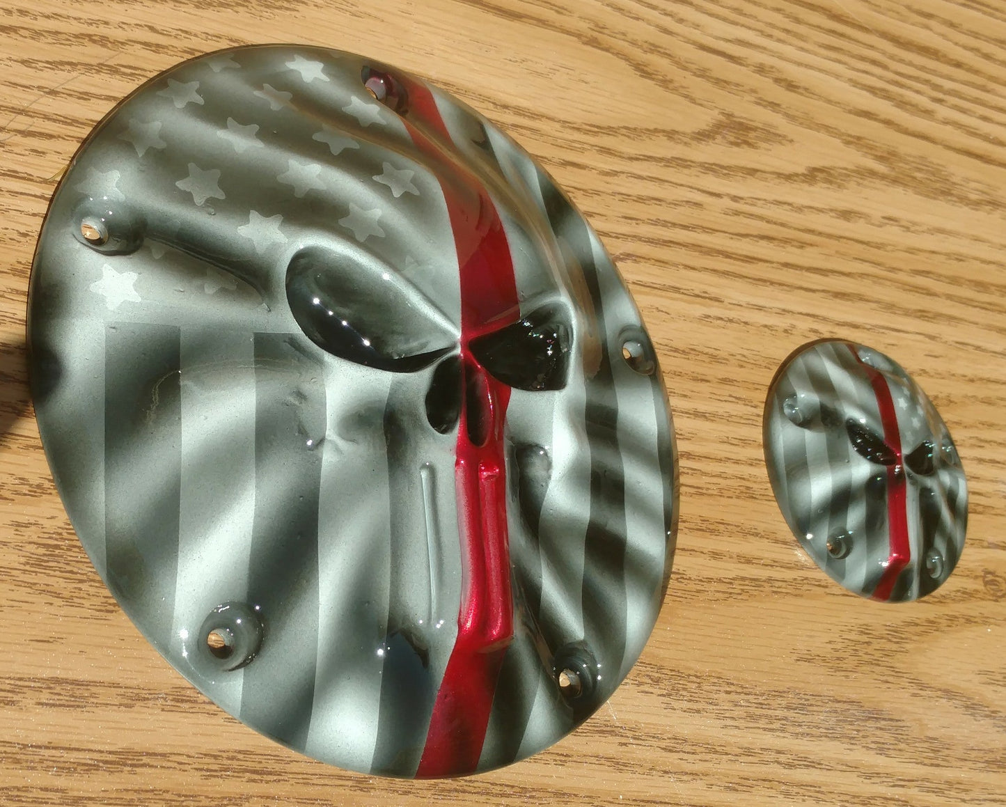 Punisher skull and firefighter themed derby and points covers