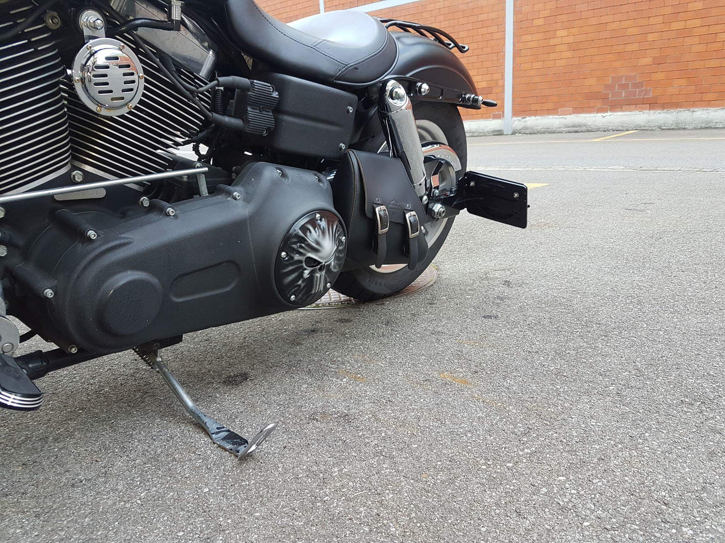 Punisher stretching through Harley derby cover