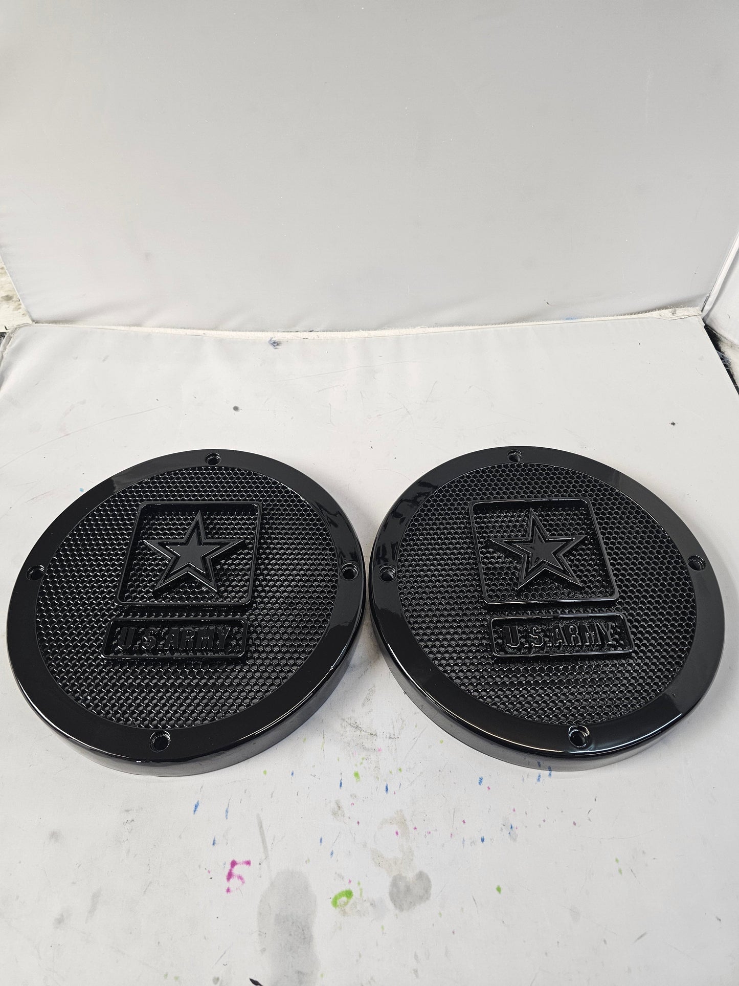 A set of Army speakers grill covers
