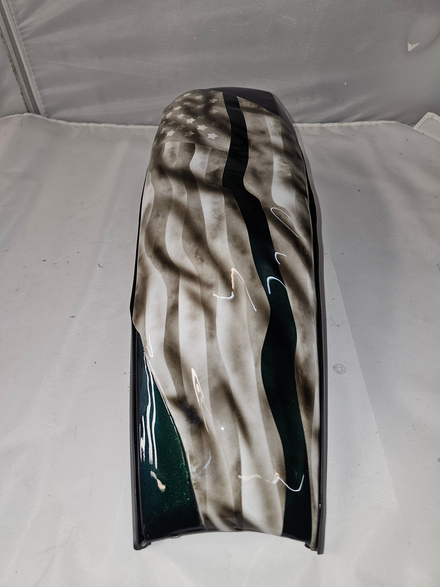 Tattered and worn full color flag Harley console